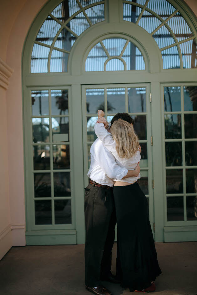 Couple hugging each other in San Diego