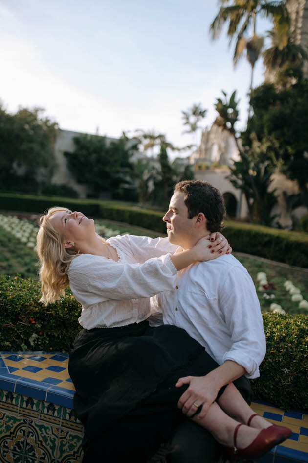 Couple hanging on each other lovingly